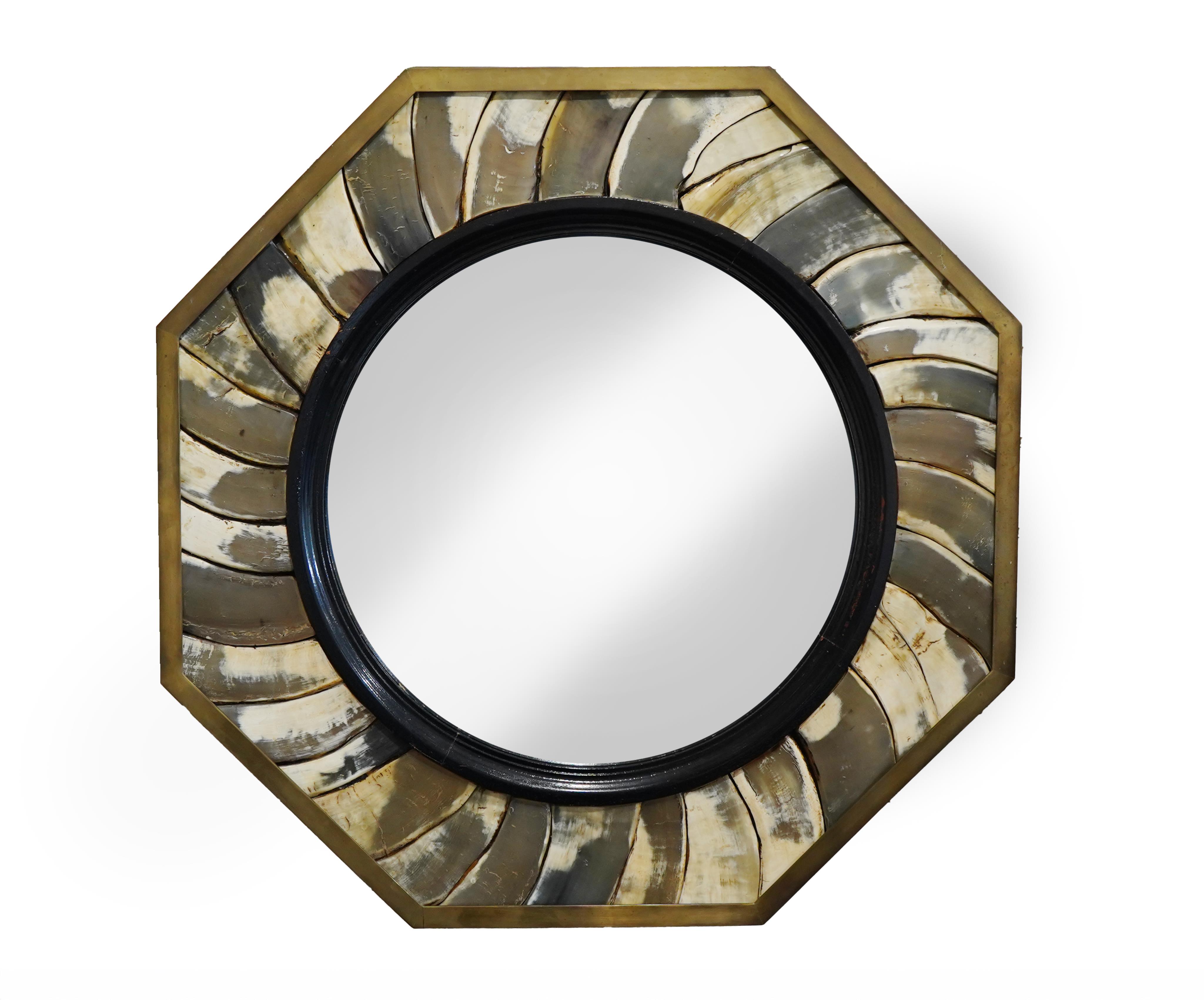 Anthony Redmile (b. 1940) An ebonised wood and horn mounted octagonal convex wall mirror